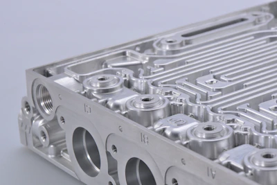 Close-up of a 3D printed mechanical part showcasing fine craftsmanship and smooth finish.