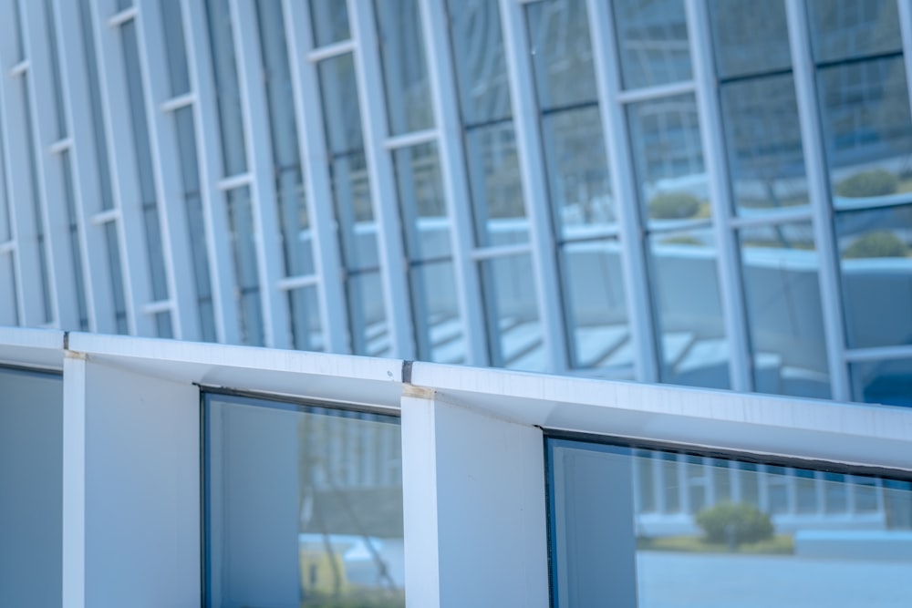 white framed glass window during daytime