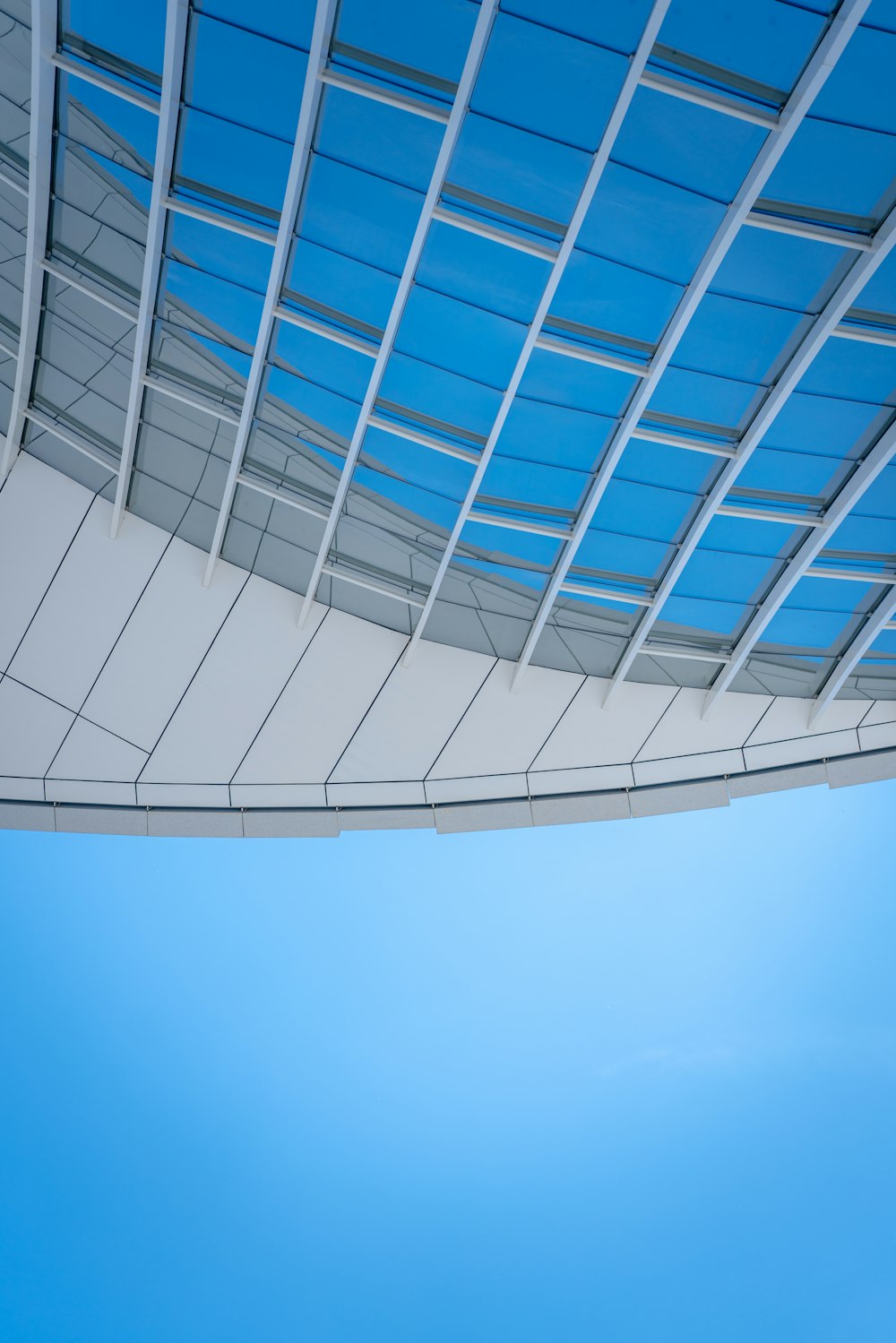 white concrete building under blue sky during daytime