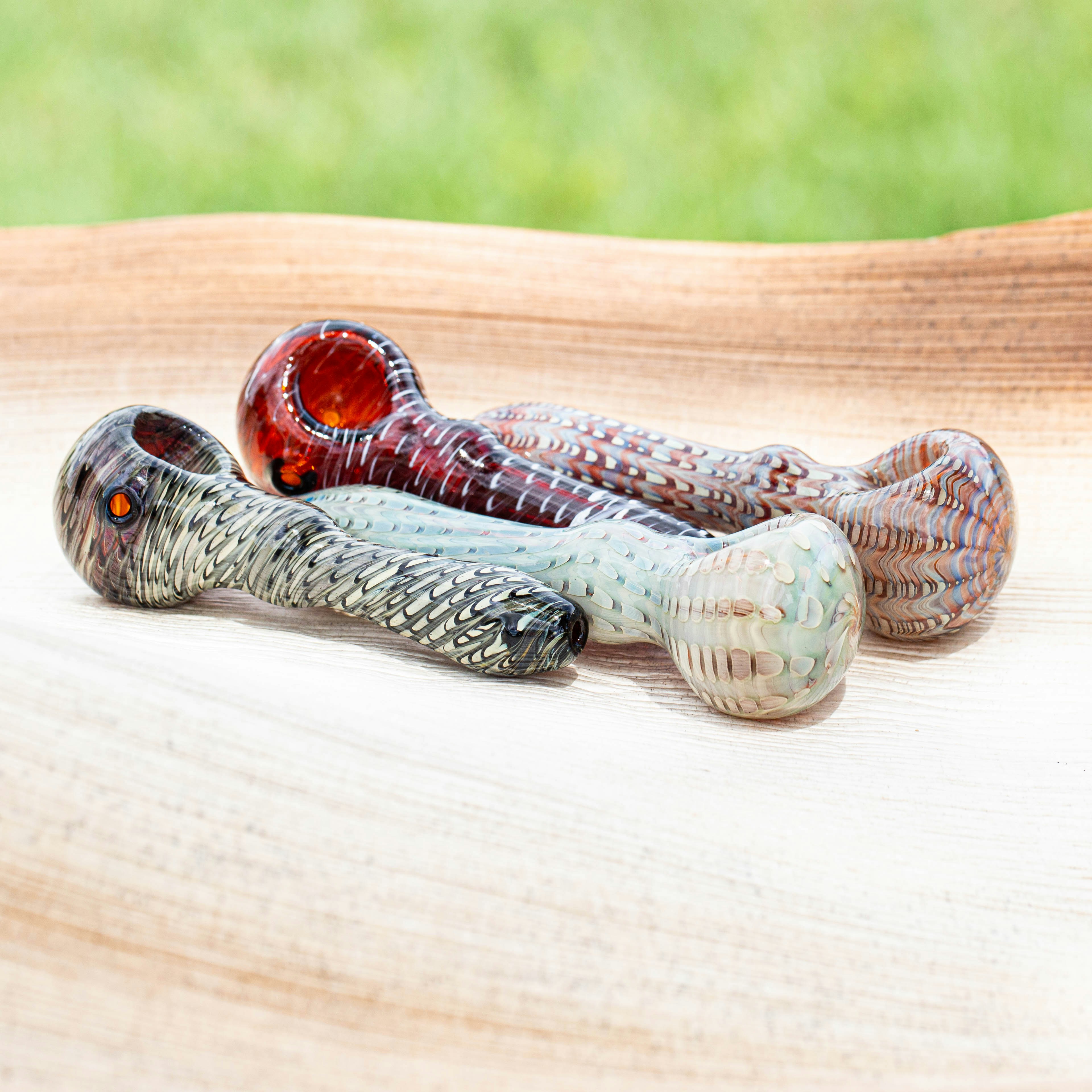 brown and white wooden figurine on brown wooden table