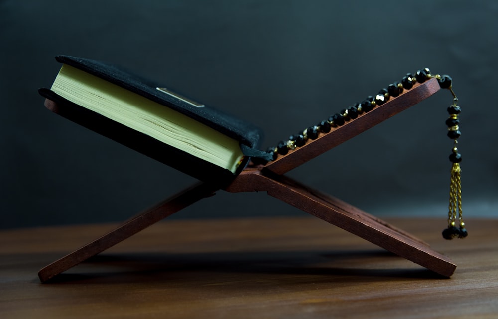 brown wooden framed black and white book