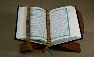 white book page on brown wooden table