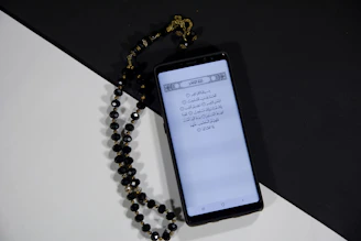 A smartphone screen displaying the Live a Life Islamic companion app interface.