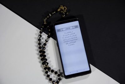 Smartphone displaying a prayer app interface with clear, user-friendly design.