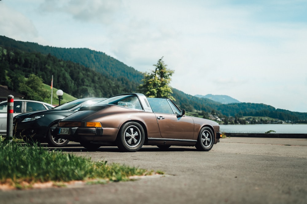 black porsche 911 on road during daytime