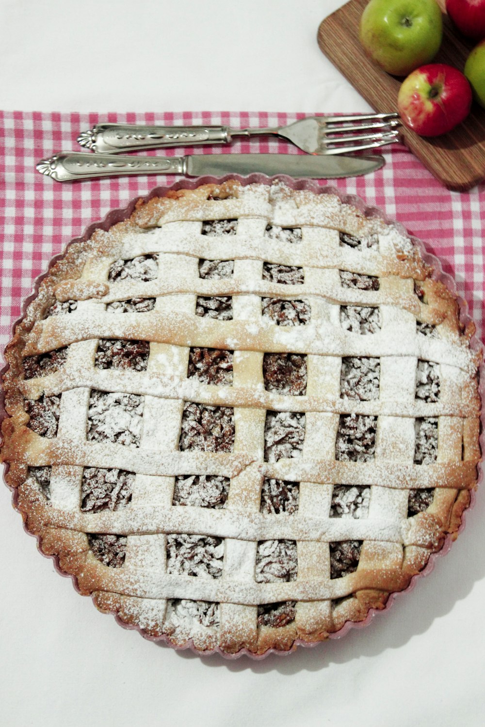 pie on red and white checkered table cloth