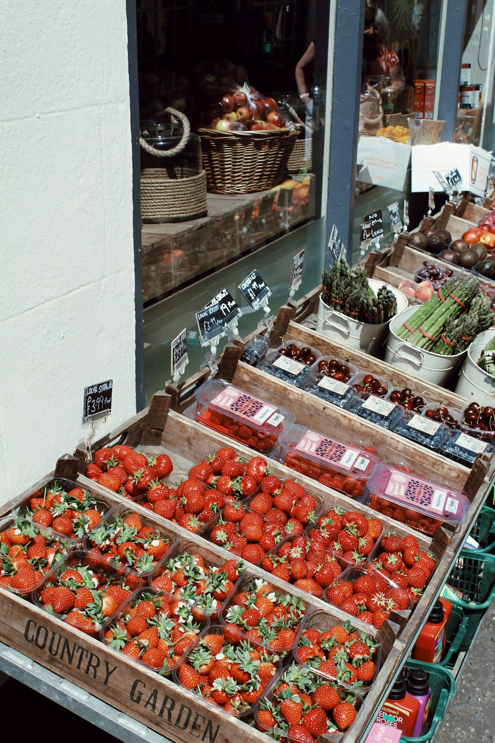 strawberries in clear plastic container