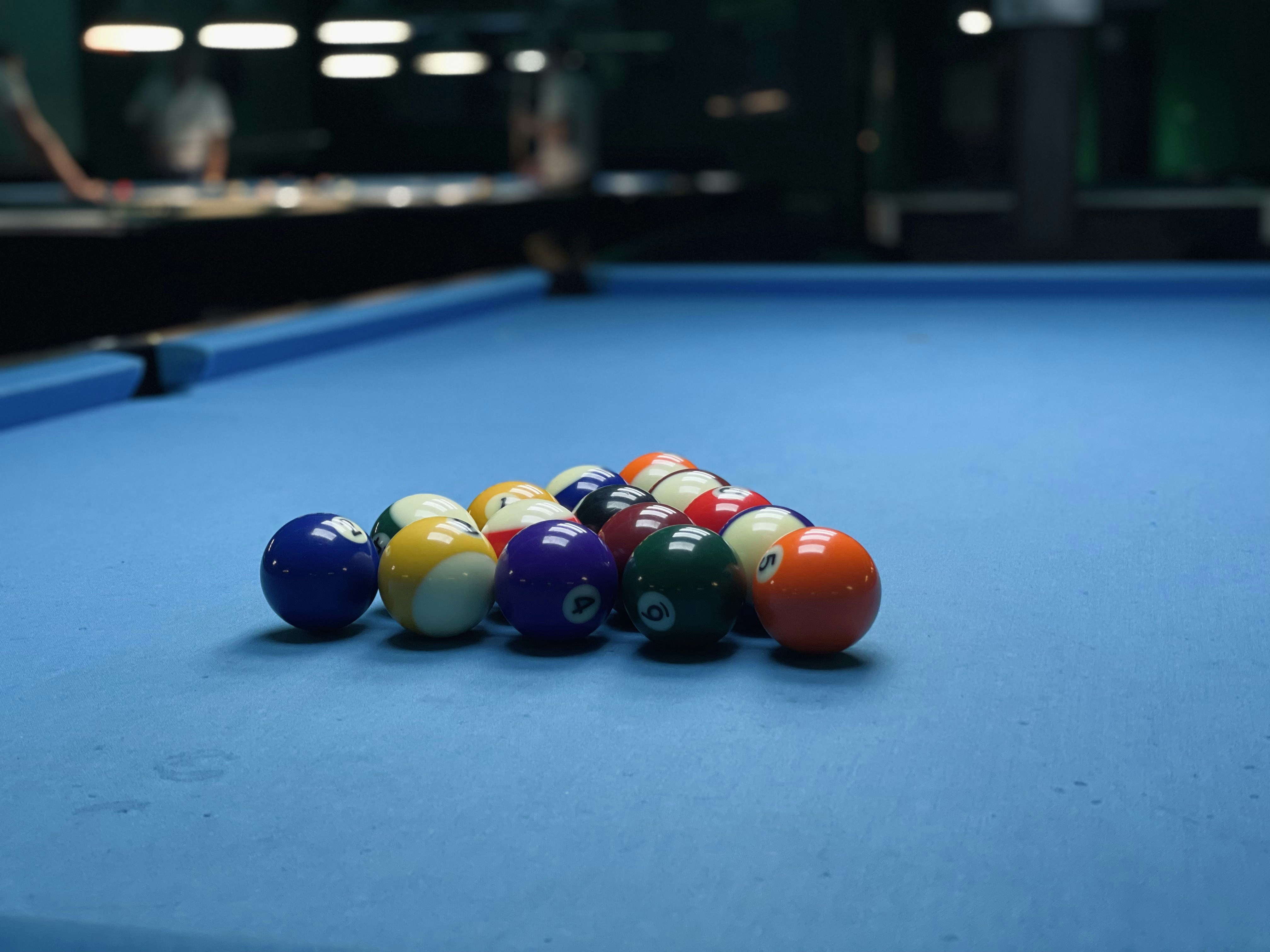 billiard balls on billiard table