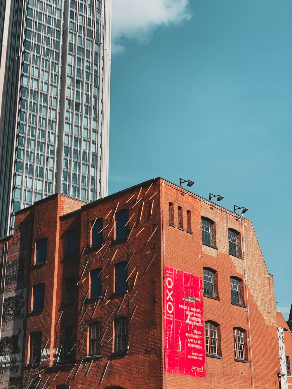 brown concrete building under blue sky during daytime