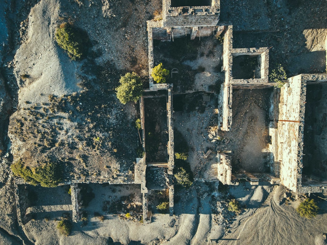 gray concrete building on cliff