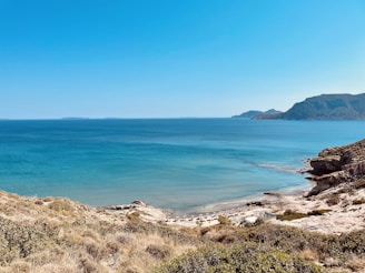 blue sea under blue sky during daytime