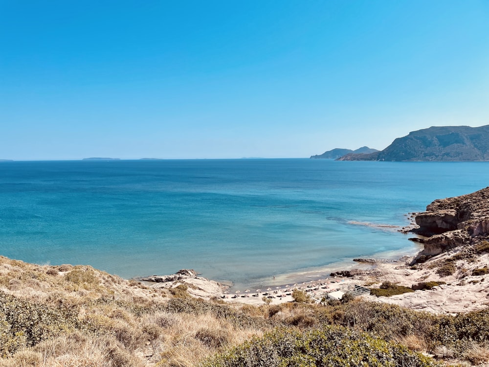 blue sea under blue sky during daytime