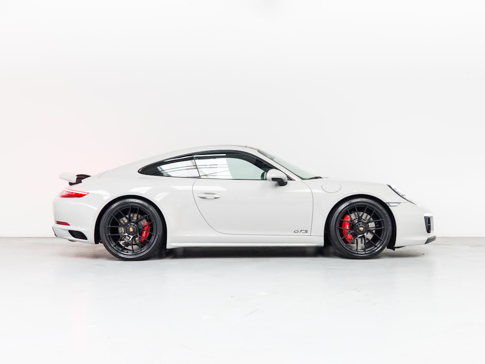 white porsche 911 on white background