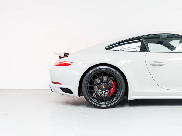 White Porsche 911 on a white background