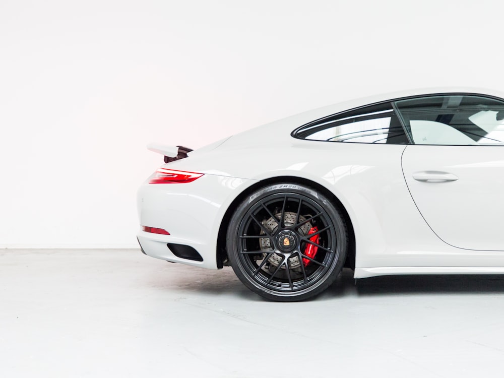 white porsche 911 on white background