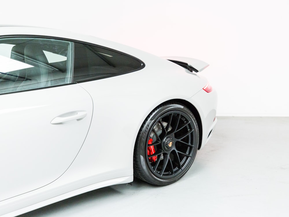 white porsche 911 on white background