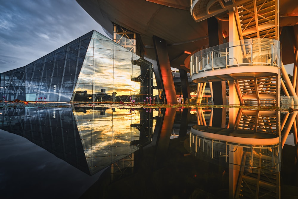 reflection of building on water during night time