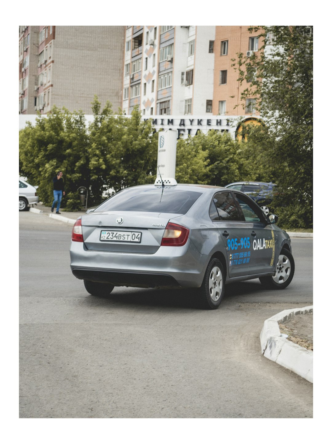 blue honda sedan on road during daytime