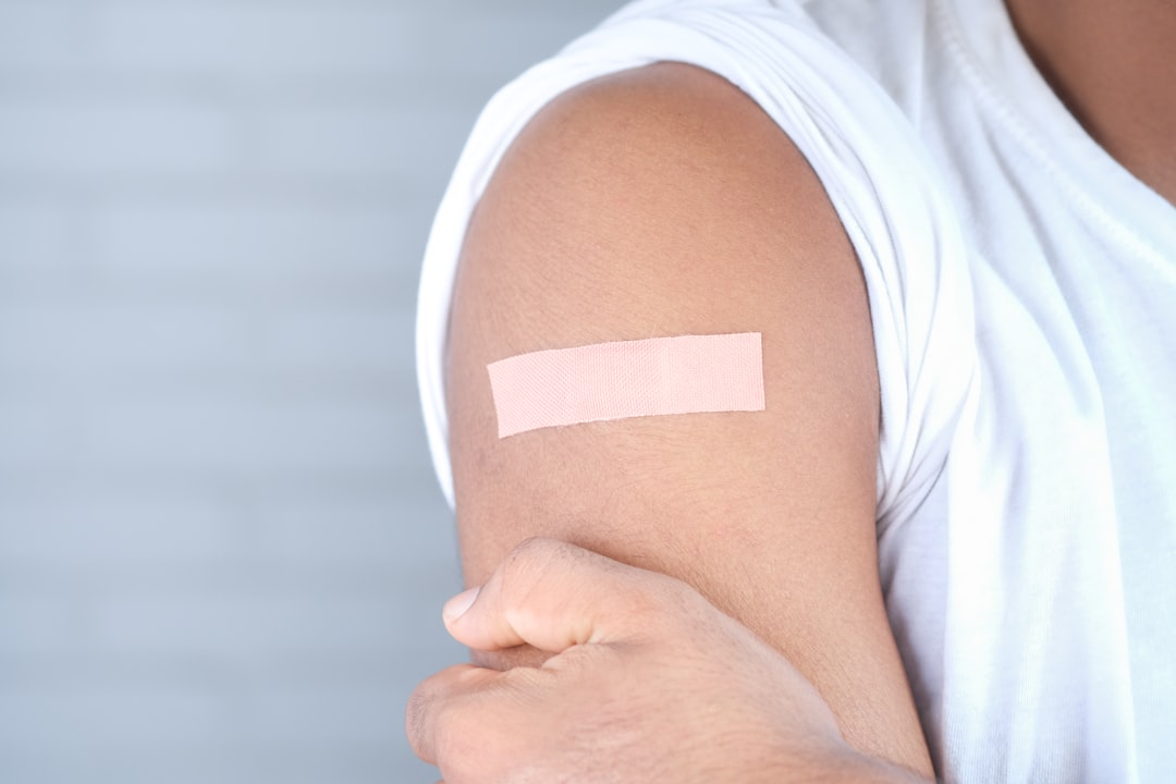 picture of an arm with a bandage on it