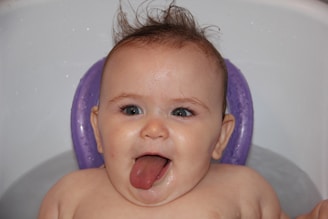 baby poking out it's tongue