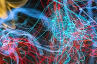 A vibrant display of colorful data streams flowing through a digital network.