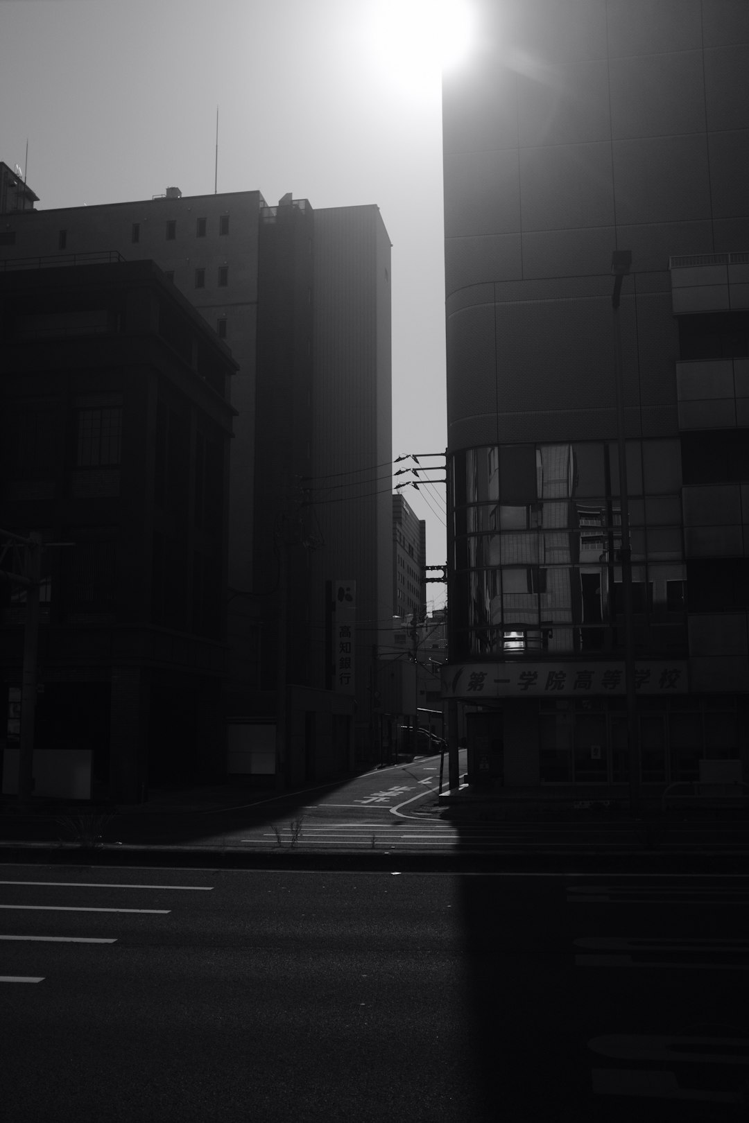 grayscale photo of city buildings