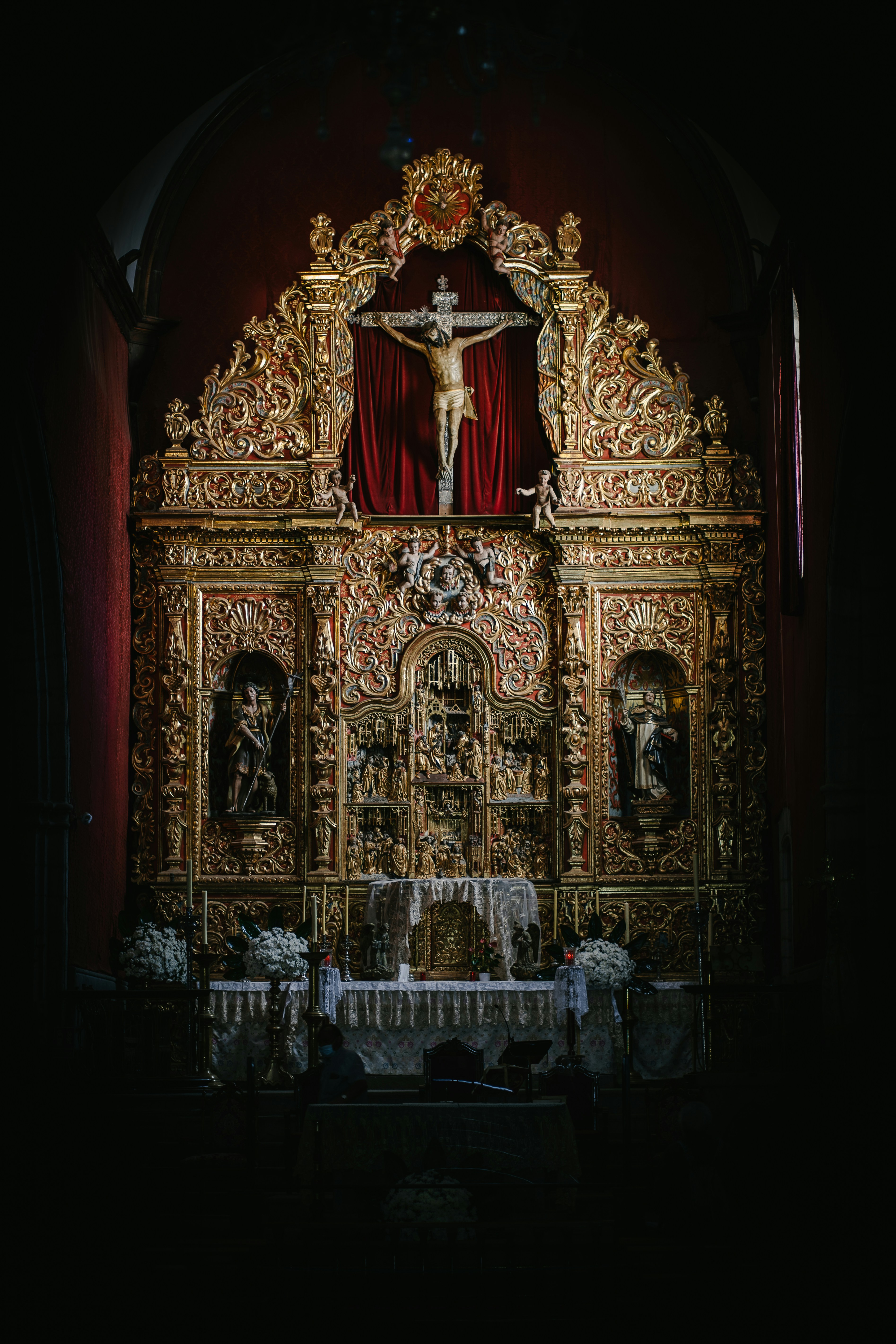 gold and black religious statue