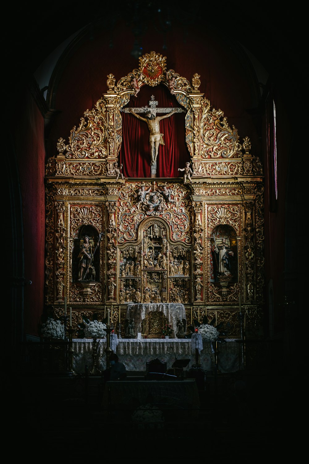 gold and black religious statue