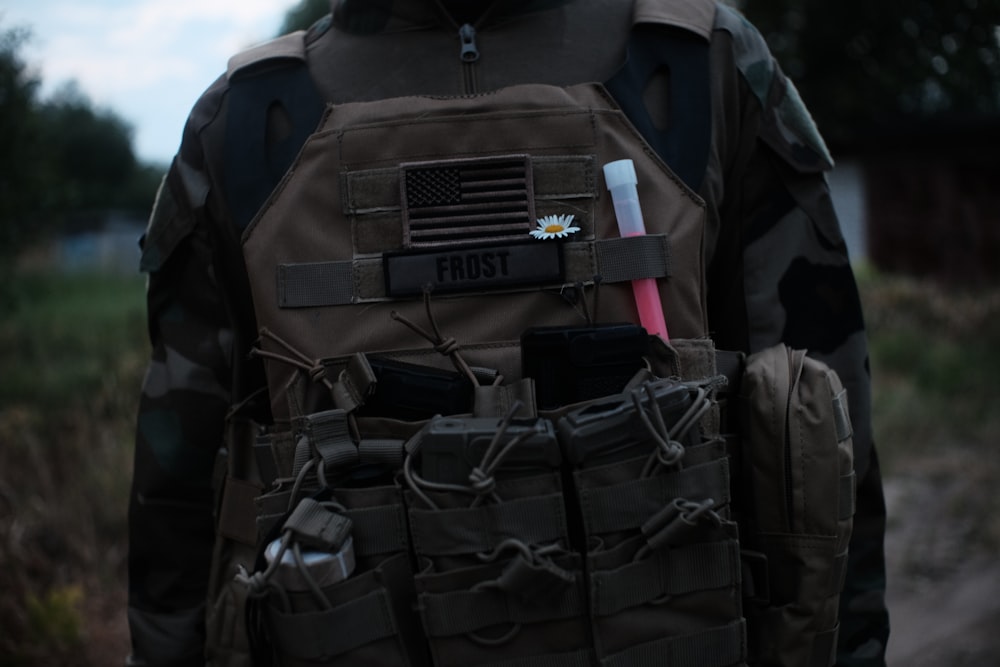 black and gray backpack on brown wooden table