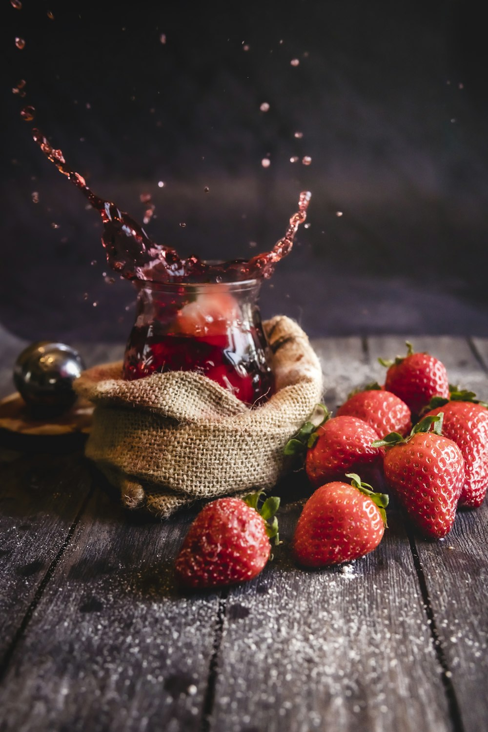 strawberries on brown wooden table