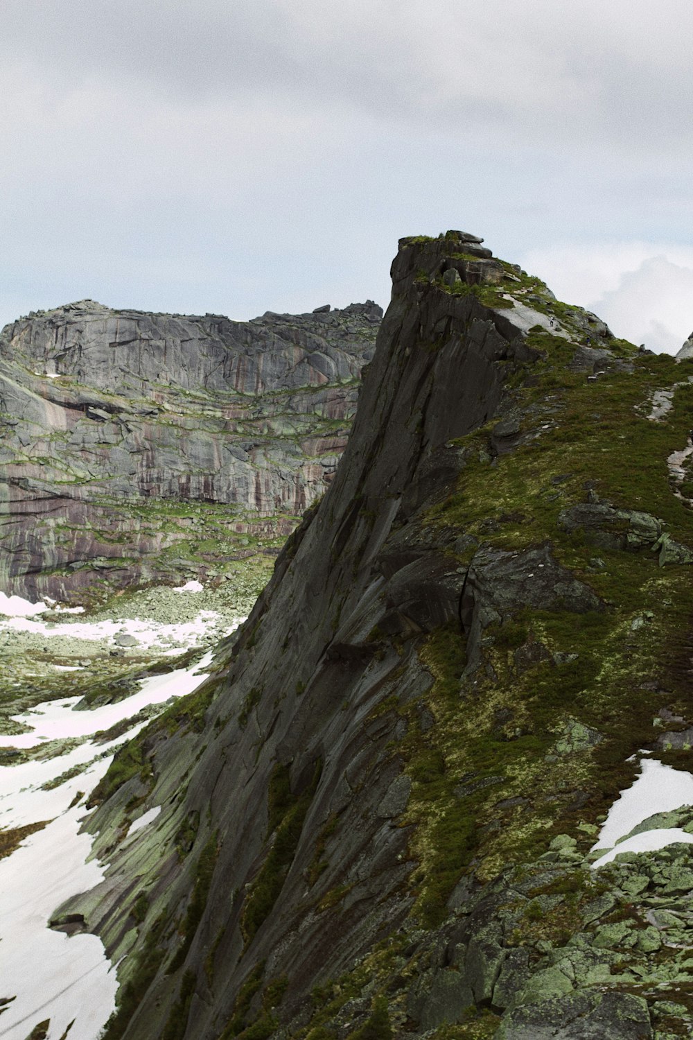 a mountain with a very tall rock face