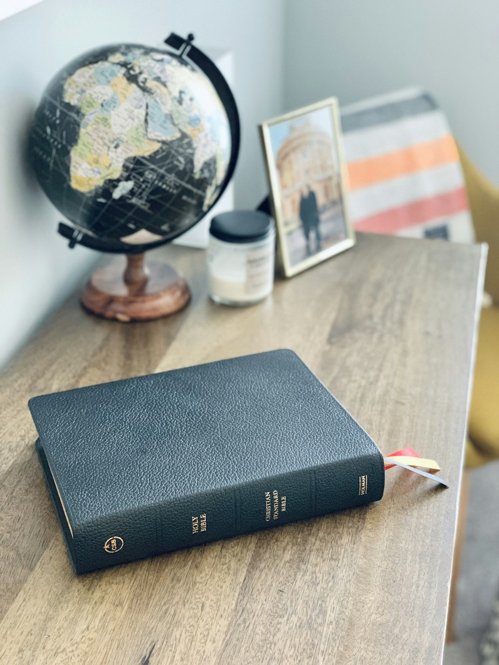 black hardbound book on table