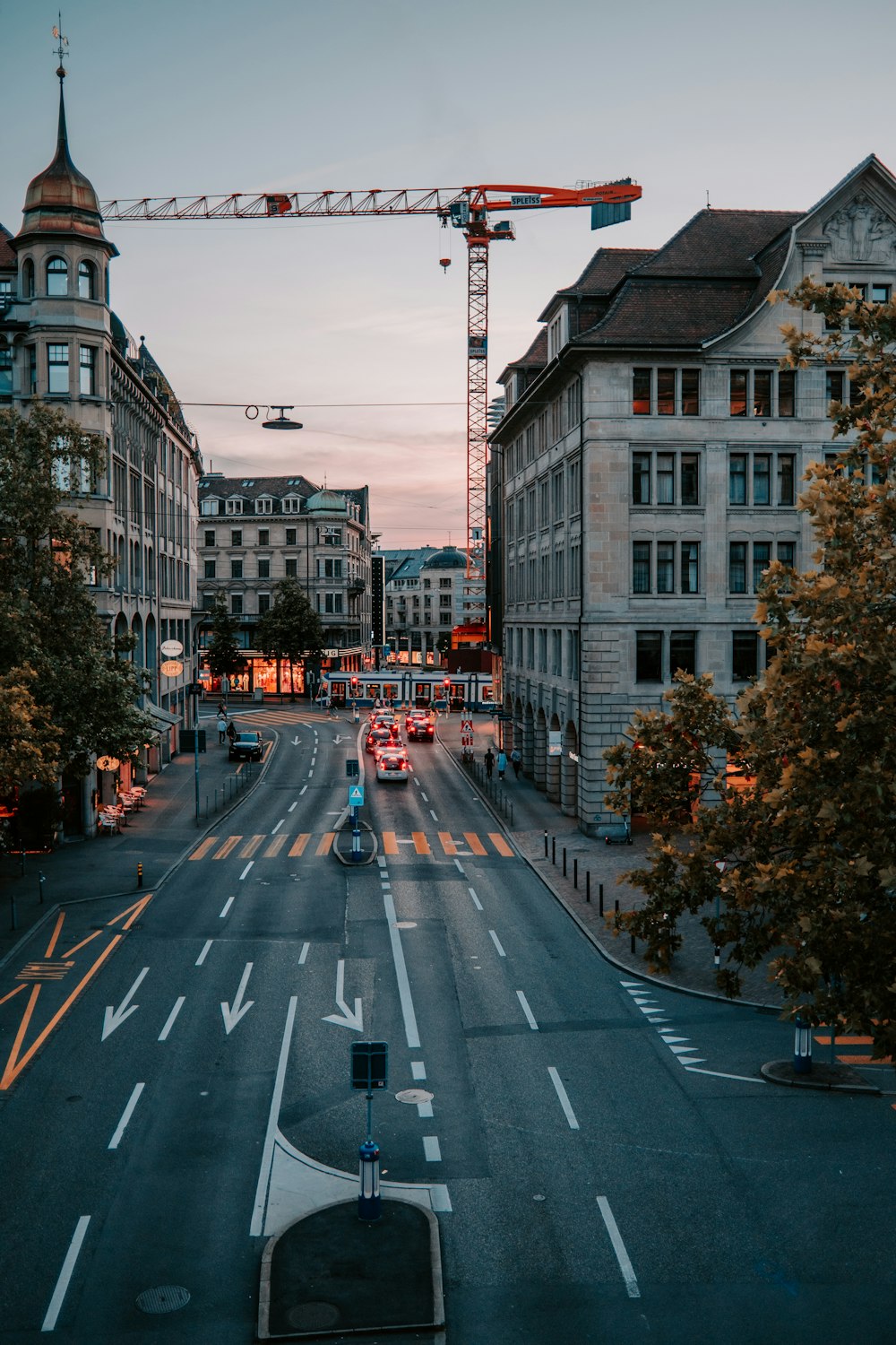 cars on road near buildings during daytime