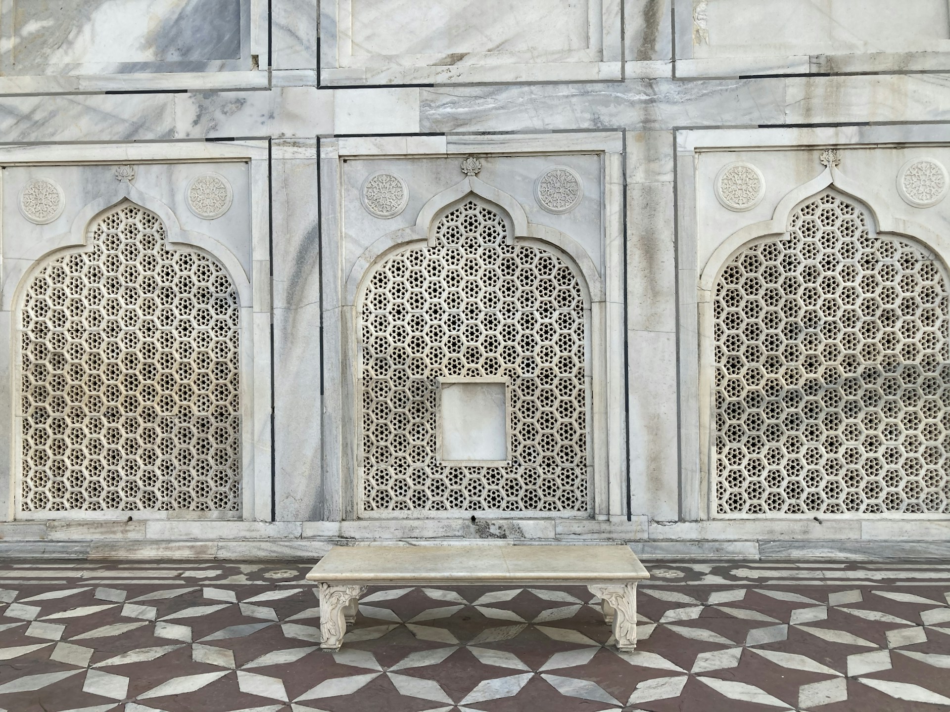 brown and white floral wooden door