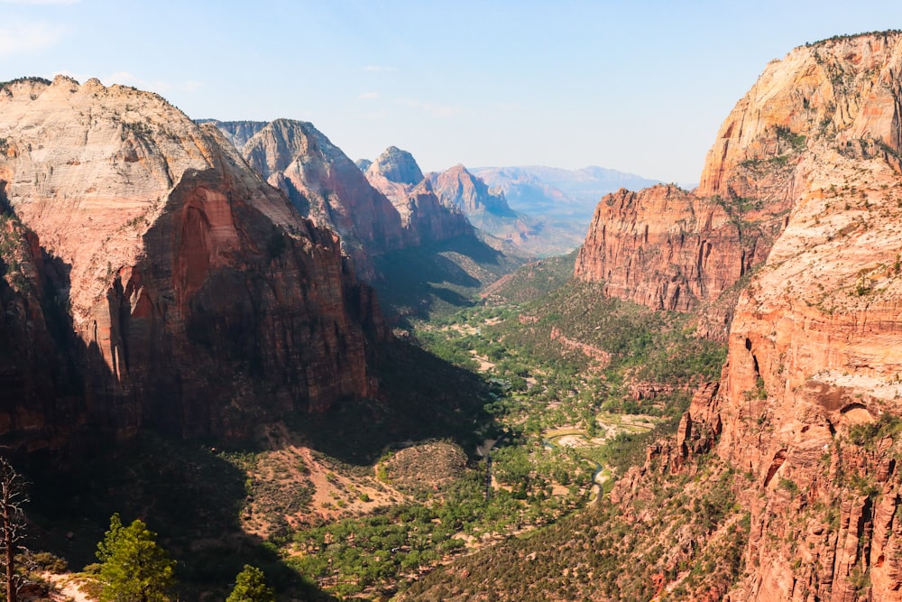 brown and green mountains under blue sky during daytime