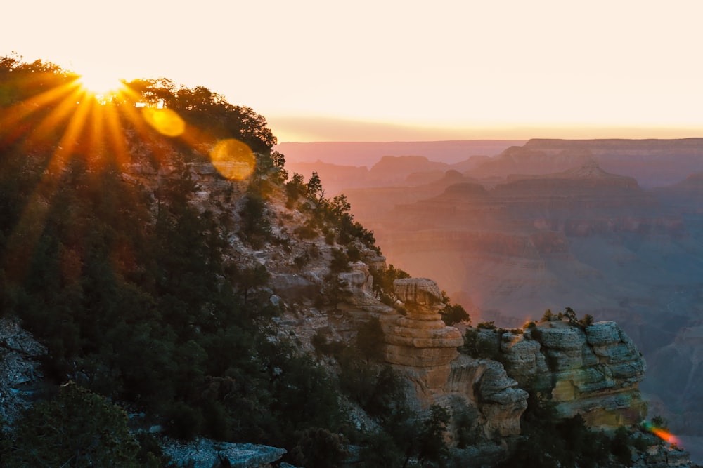 brown rocky mountain during sunset