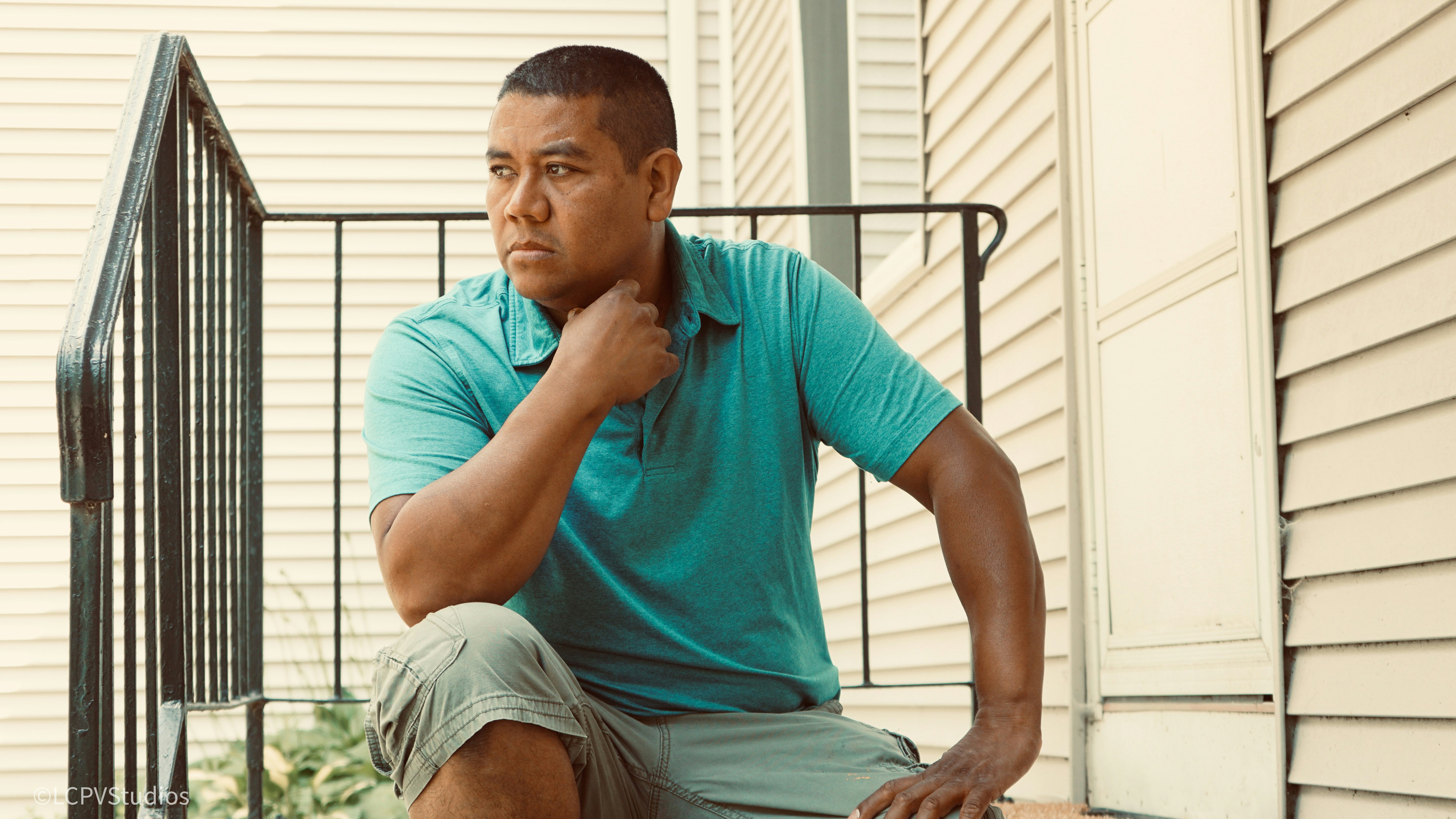 homeowner looking at a high energy bill with a concerned expression