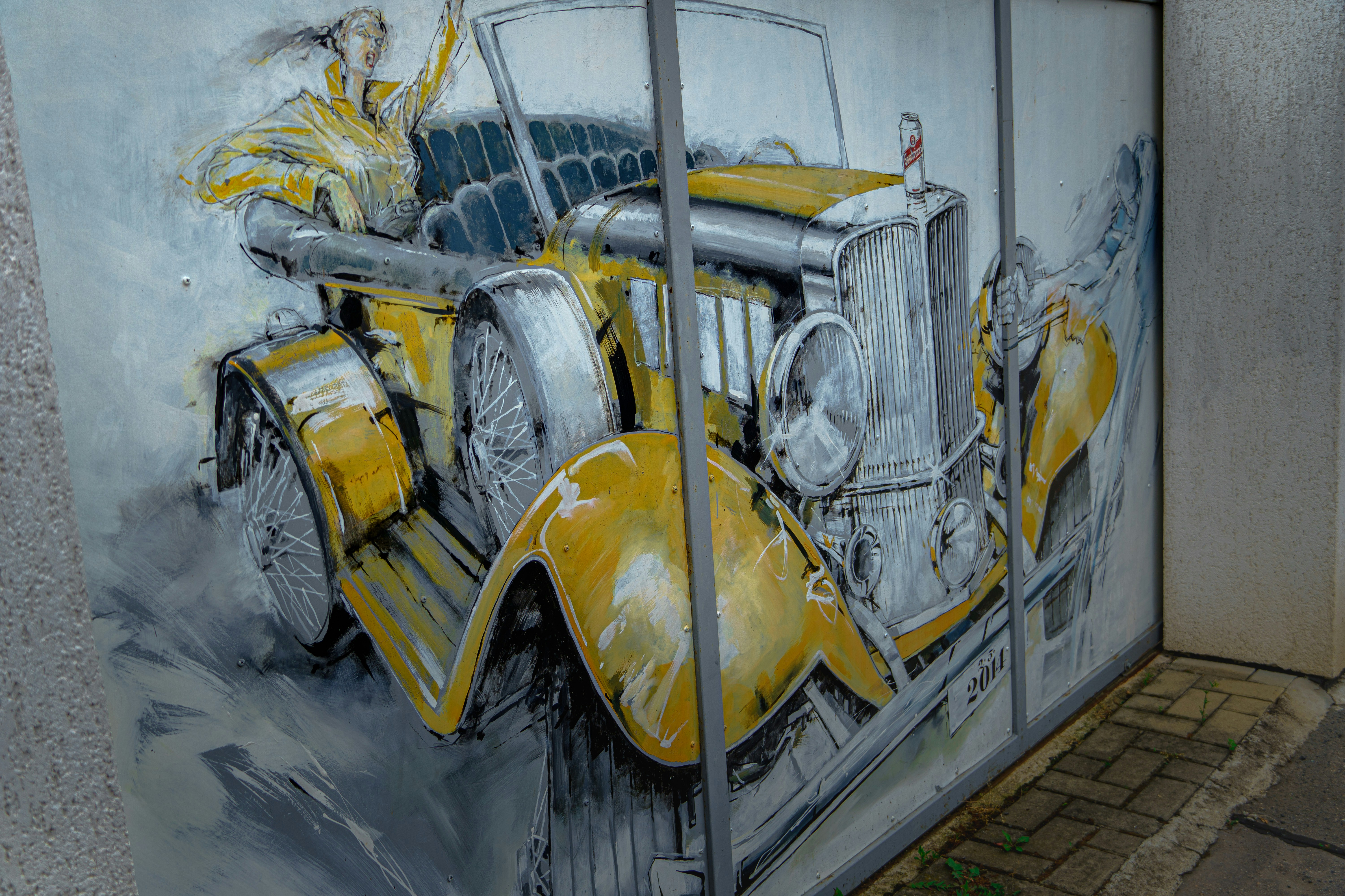 yellow and silver vintage car