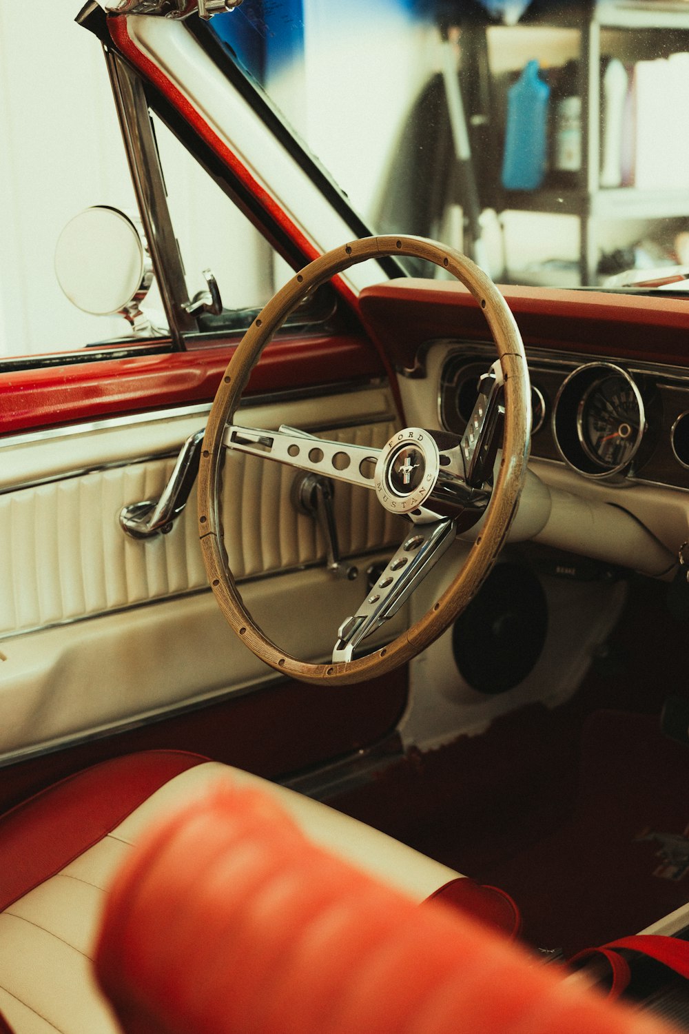 white and red car steering wheel