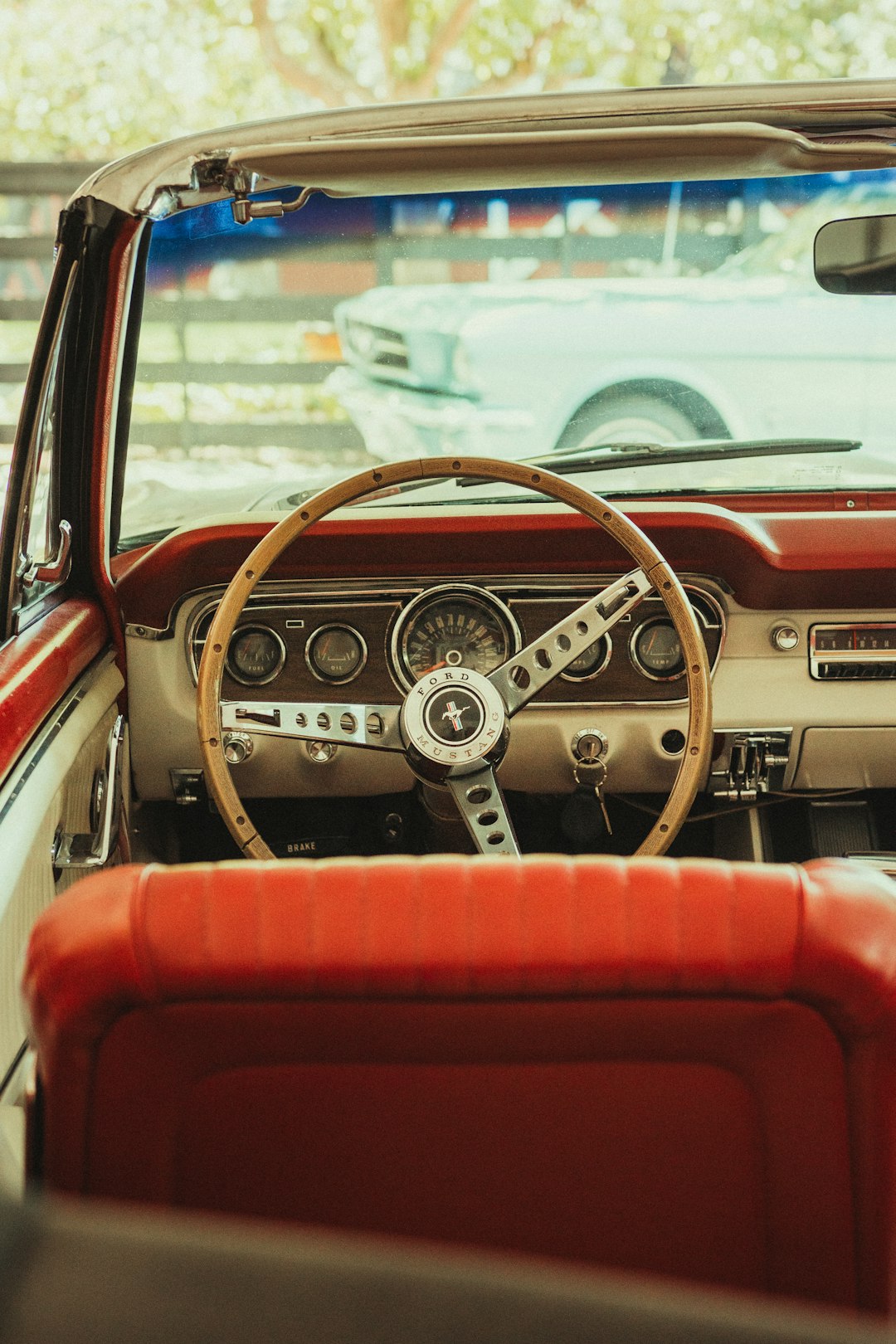 red and black car steering wheel