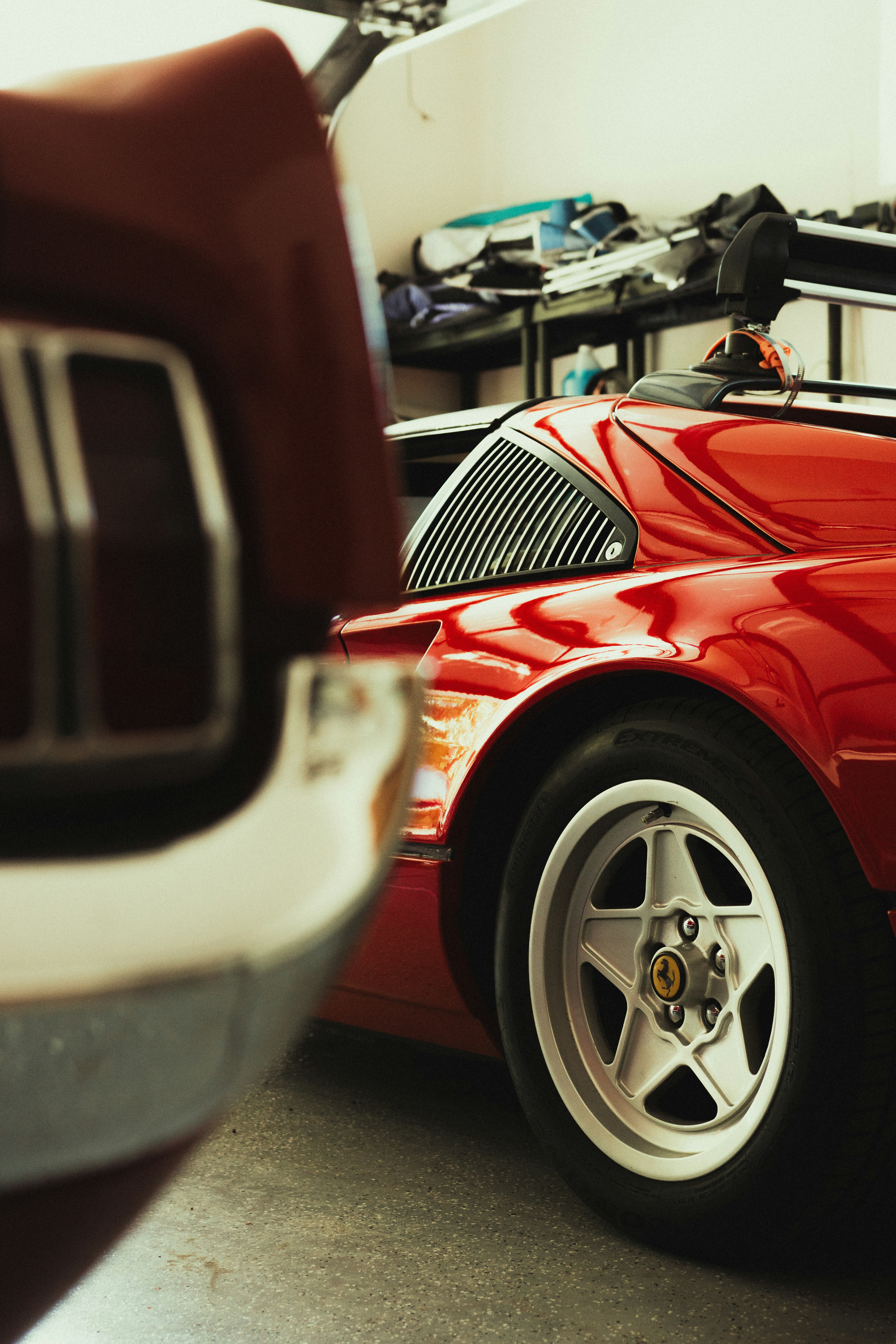 red and white car in a parking lot