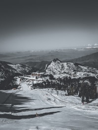 snow covered mountain during daytime