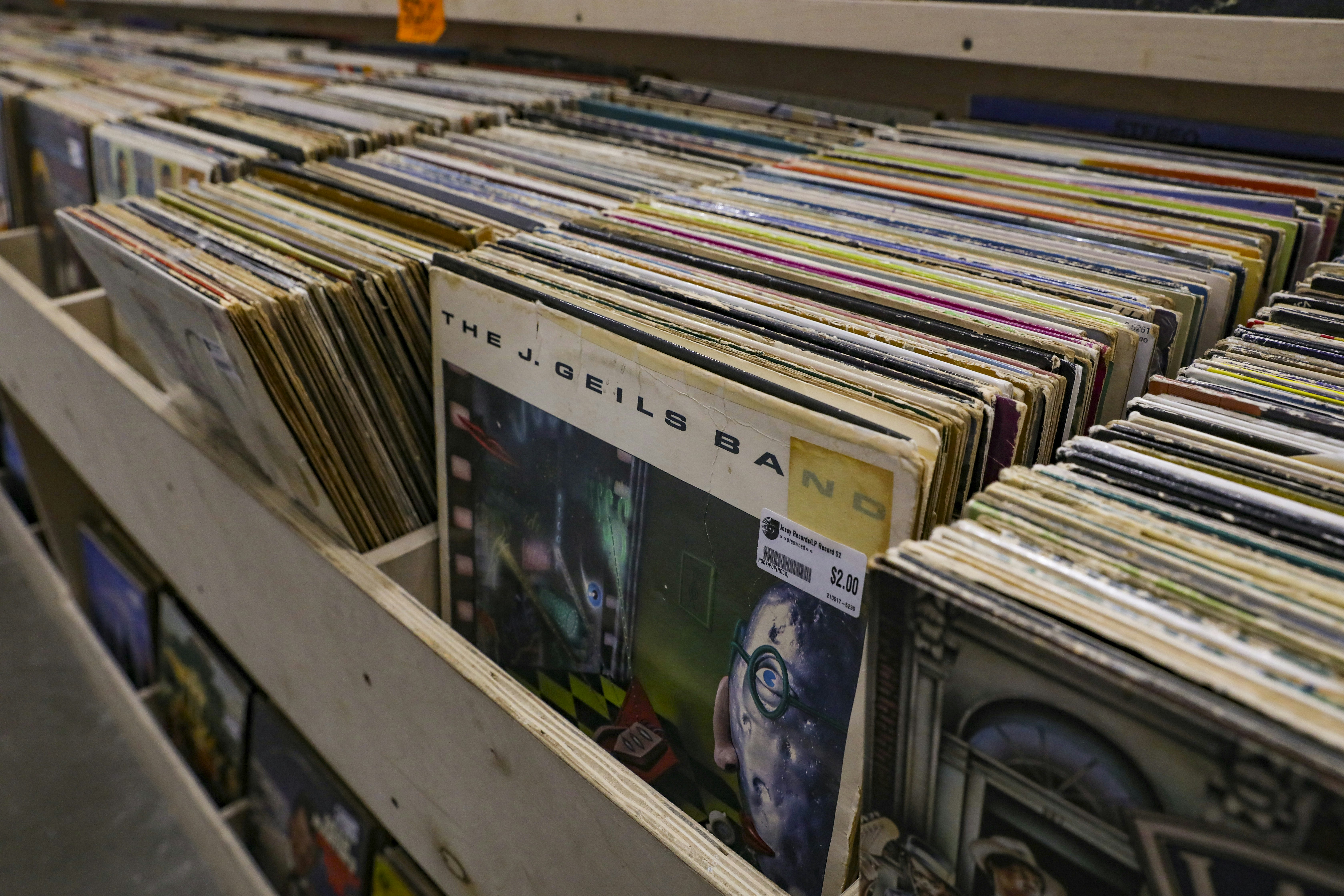 books on white wooden shelf
