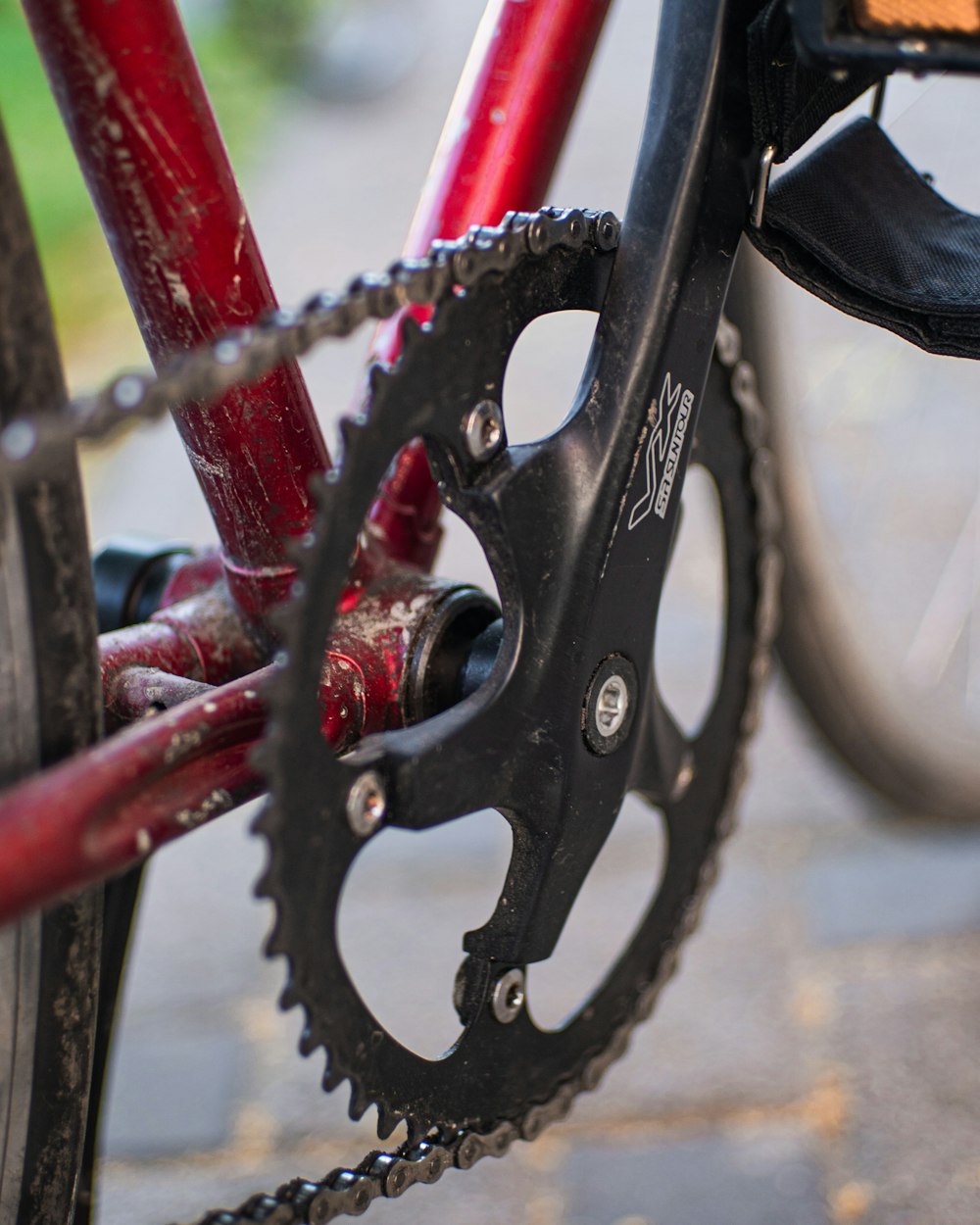 red and silver bicycle wheel