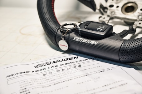 black and silver mercedes benz car fob