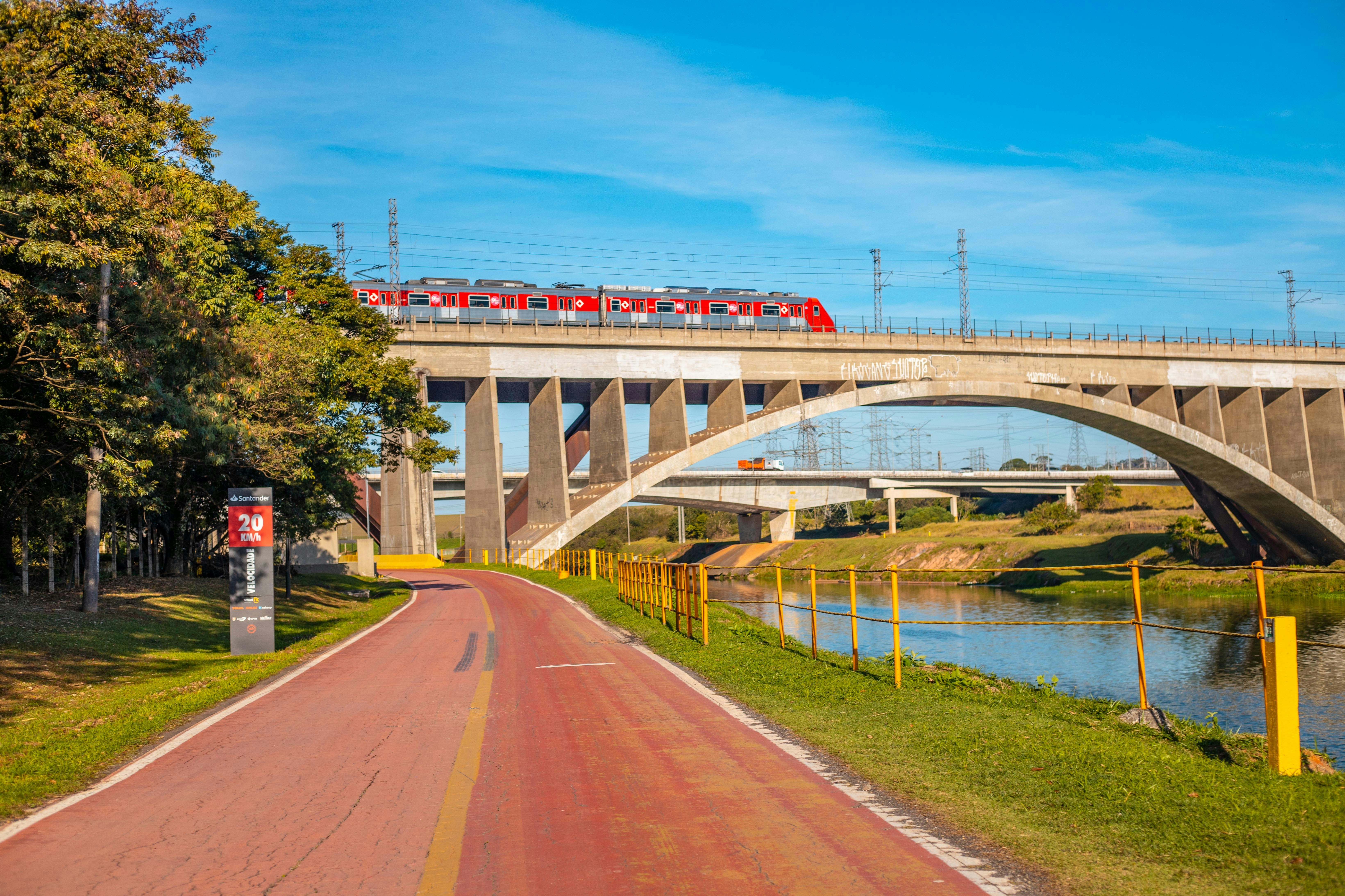 red and white bridge over river