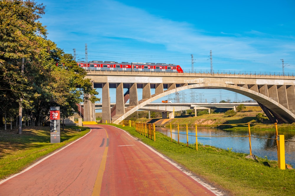 red and white bridge over river