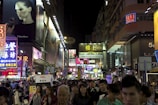 A vibrant city street filled with Gen Z influencers.