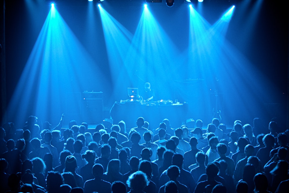 people watching concert during night time