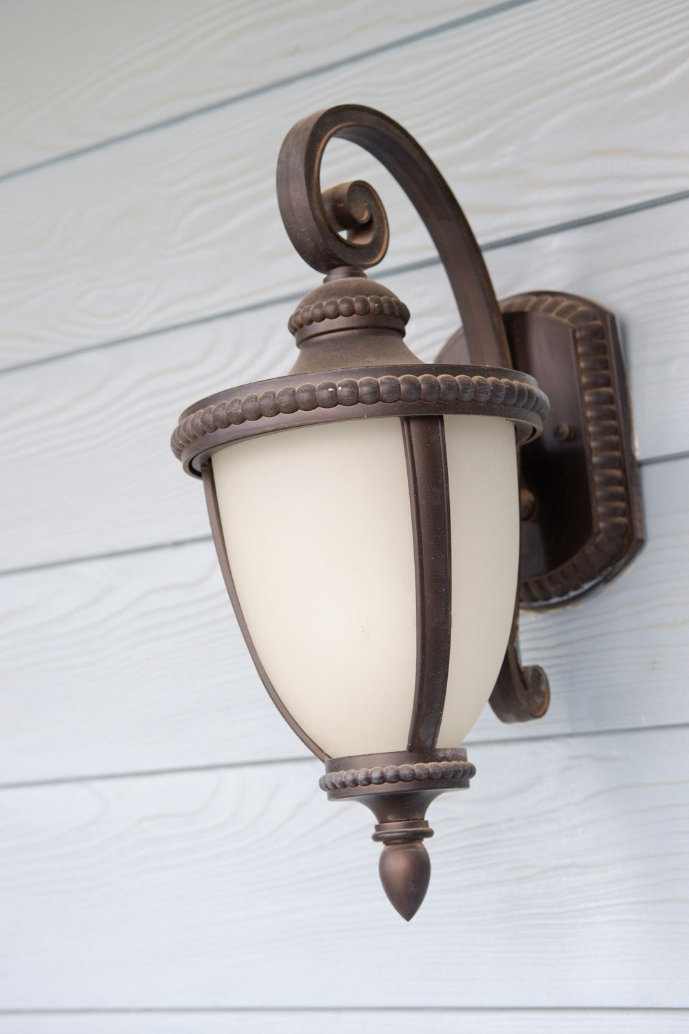 brown and white ceramic vase